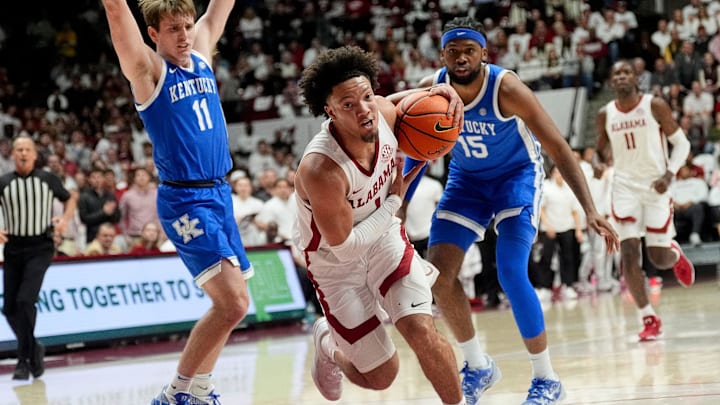Feb 22, 2025; Tuscaloosa, AL, USA; Alabama guard Mark Sears (1) is fouled as he splits between Kentucky guard Travis Perry (11) and Kentucky forward Ansley Almonor (15) at Coleman Coliseum. Mandatory Credit: Gary Cosby Jr.-Tuscaloosa News Feb 22, 2025; Tuscaloosa, AL, USA; Alabama guard Mark Sears (1) is fouled as he splits between Kentucky guard Travis Perry (11) and Kentucky forward Ansley Almonor (15) at Coleman Coliseum. Mandatory Credit: Gary Cosby Jr.-Tuscaloosa News