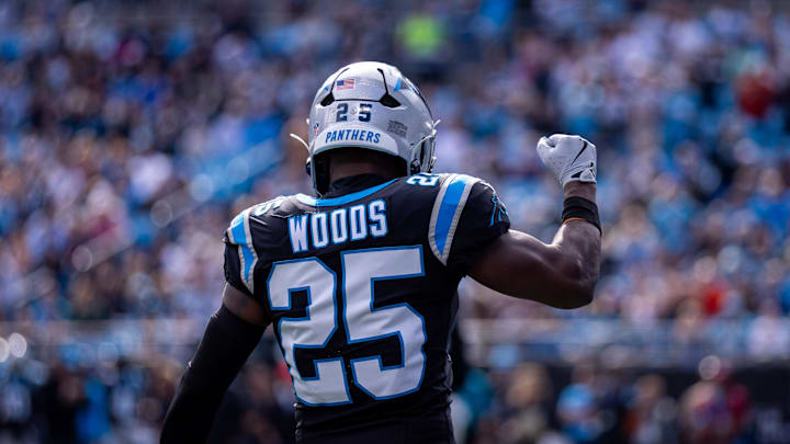 Nov 3, 2024; Charlotte, North Carolina, USA; Carolina Panthers safety Xavier Woods (25) celebrates during the first quarter against the New Orleans Saints at Bank of America Stadium. Mandatory Credit: Scott Kinser-Imagn Images