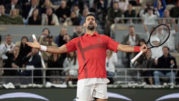 Jun 6, 2025; Paris, FR;  Novak Djokovic of Serbia reacts to a point during his match against Jannik Sinner of Italy on day 13 at Roland Garros Stadium. Mandatory Credit: Susan Mullane-Imagn Images
