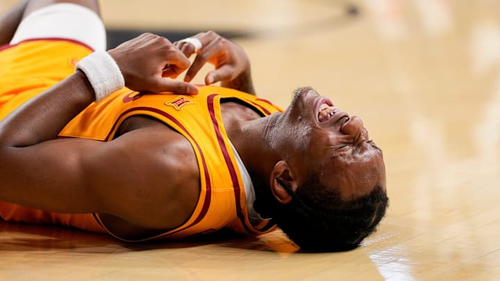 Iowa State Cyclones guard Jamarion Batemon (1) is knocked to the floor in the first half of the NCAA Big 12 basketball game between the Cincinnati Bearcats and the Iowa State Cyclones at Fifth Third Stadium in Cincinnati on Saturday, Jan. 17, 2026.