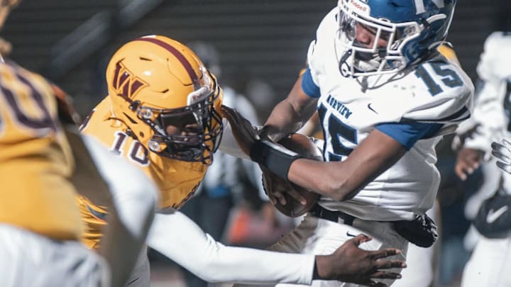 Warwick High School LB Tracy Pope Jr. makes a critical tackle against Norview.