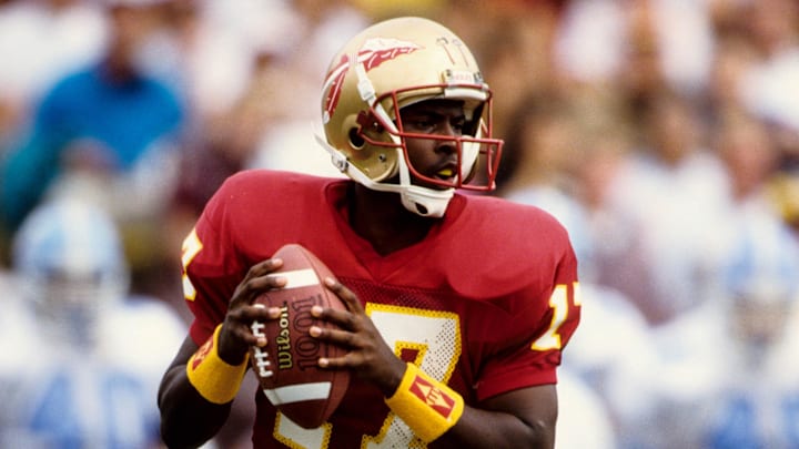 Oct 10, 1992; Tallahassee, FL, USA: FILE PHOTO; Florida State Seminoles quarterback Charlie Ward (17) looks to throw against North Carolina at Doak Campbell Stadium. FSU defeated North Carolina 36-13. Mandatory Credit: Imagn Images