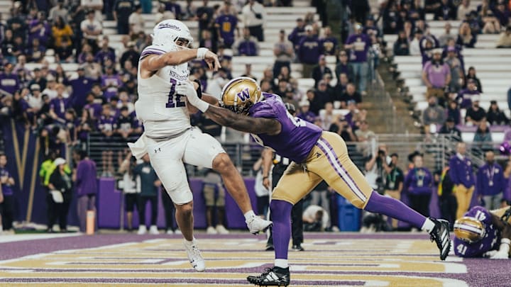 Jayden Wayne applies end-zone pressure to the Northwestern quarterback. Jayden Wayne applies end-zone pressure to the Northwestern quarterback.