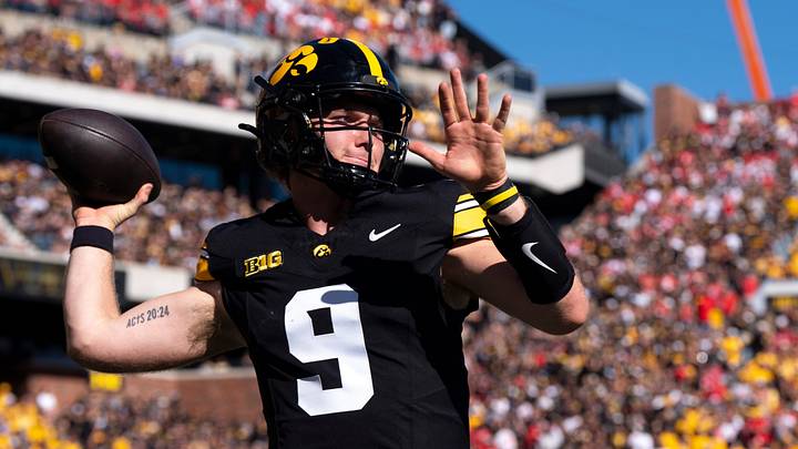 Iowa Hawkeyes quarterback Hank Brown (9) warms up before Iowa’s second offensive series against the Ohio State Buckeyes Oct. 3, 2026 at Kinnick Stadium in Iowa City, Iowa. Iowa Hawkeyes quarterback Hank Brown (9) warms up before Iowa’s second offensive series against the Ohio State Buckeyes Oct. 3, 2026 at Kinnick Stadium in Iowa City, Iowa.
