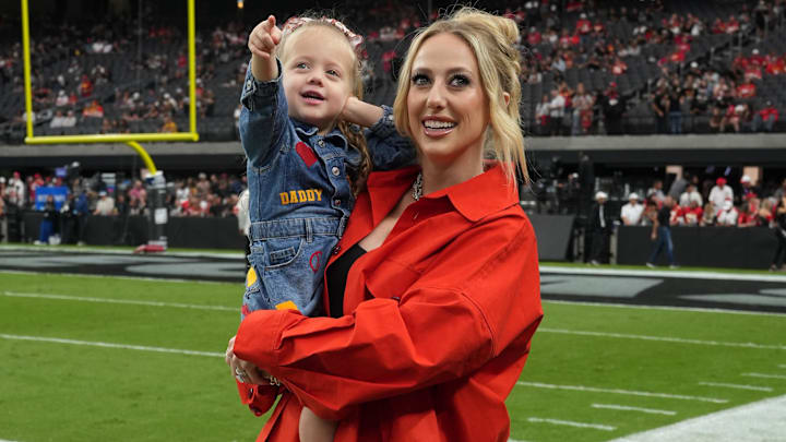 Brittany Mahomes, the wife of Kansas City Chiefs quarterback Patrick Mahomes (15) holds daughter Sterling Mahomes during the game against the Las Vegas Raiders at Allegiant Stadium.