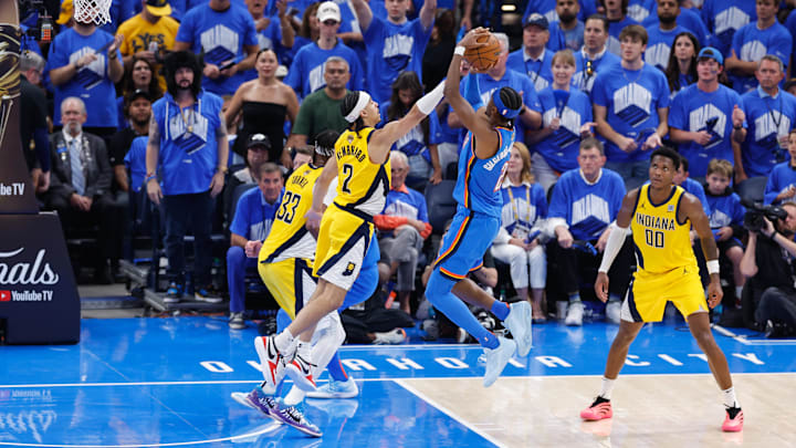 Jun 22, 2025; Oklahoma City, Oklahoma, USA: Oklahoma City Thunder guard Shai Gilgeous-Alexander (2) jumps for a shoots the ball as Indiana Pacers guard Andrew Nembhard (2) defends during the second half of game seven of the 2025 NBA Finals at Paycom Center. Mandatory Credit: Alonzo Adams-Imagn Images Jun 22, 2025; Oklahoma City, Oklahoma, USA: Oklahoma City Thunder guard Shai Gilgeous-Alexander (2) jumps for a shoots the ball as Indiana Pacers guard Andrew Nembhard (2) defends during the second half of game seven of the 2025 NBA Finals at Paycom Center. Mandatory Credit: Alonzo Adams-Imagn Images
