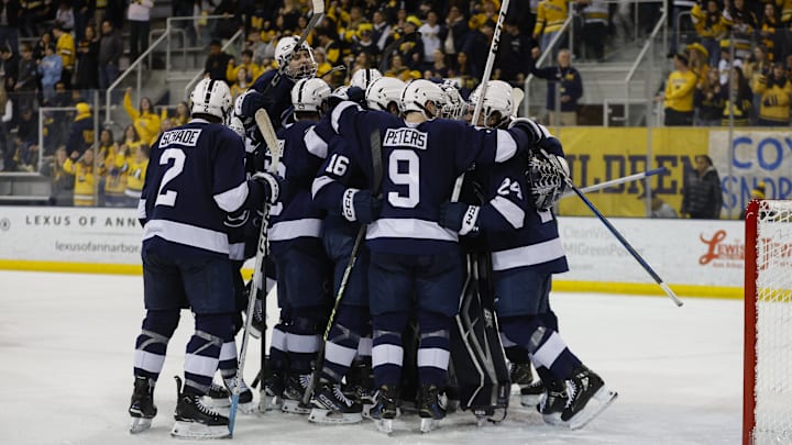 March 8, 2025; Ann Arbor, Michigan, USA; The Penn State Nittany Lions celebrate their win over the Michigan Wolverines at Yost Ice Arena. Mandatory Credit: Brian Bradshaw Sevald-Imagn Images