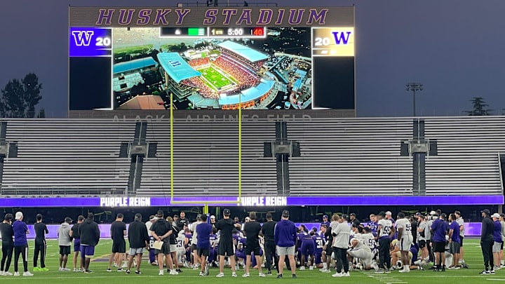 Jedd Fisch meets with his team following Saturday night's scrimmage. Jedd Fisch meets with his team following Saturday night's scrimmage.