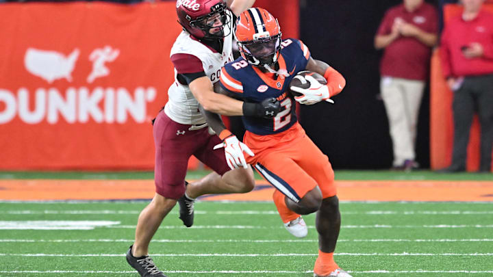 Syracuse Orange wide receiver Johntay Cook (2) runs from Colgate Raiders defensive back Kenny Langston (22)