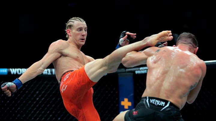 Apr 12, 2025; Miami, Florida, UNITED STATES; Michael Chandler (red gloves) fights against Paddy Pimblett (blue gloves) during UFC 314 at Kaseya Center. Mandatory Credit: Sam Navarro-Imagn Images Apr 12, 2025; Miami, Florida, UNITED STATES; Michael Chandler (red gloves) fights against Paddy Pimblett (blue gloves) during UFC 314 at Kaseya Center. Mandatory Credit: Sam Navarro-Imagn Images