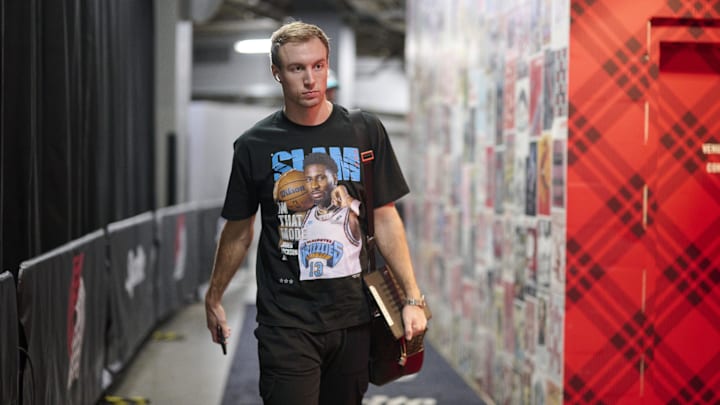 Mar 19, 2025; Portland, Oregon, USA; Memphis Grizzlies guard Luke Kennard (10) walks to the locker room before a game against the Portland Trail Blazers at Moda Center. Mandatory Credit: Troy Wayrynen-Imagn Images