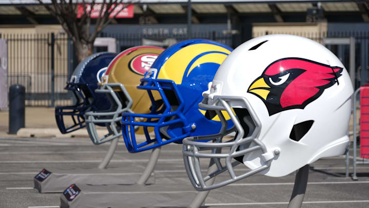 Feb 27, 2025; Indianapolis, IN, USA; NFC West helmets of the Arizona Cardinals, Los Angeles Rams, San Francisco 49ers and Seattle Seahawks at the 2025 NFL Scouting Combine Experience at Lucas Oil Stadium. Mandatory Credit: Kirby Lee-Imagn Images