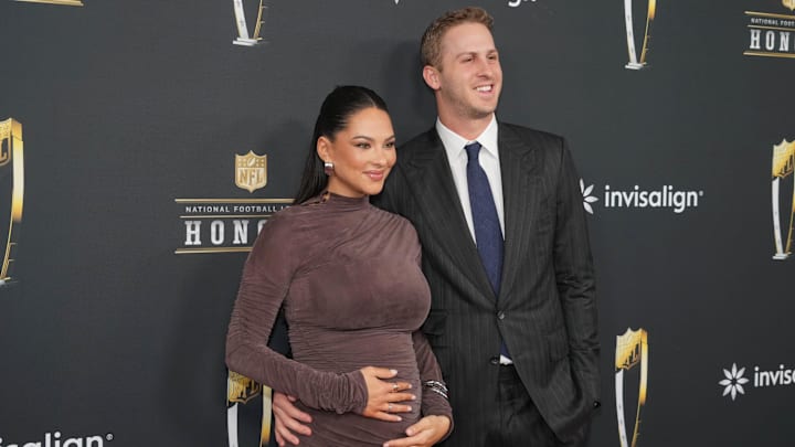 Jared Goff and his wife Christen Harper on the red carpet before Super Bowl LIX NFL Honors at Saenger Theatre.