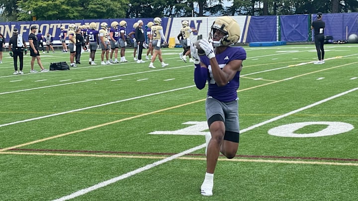 Justice Williams hauls in a fall camp pass. 