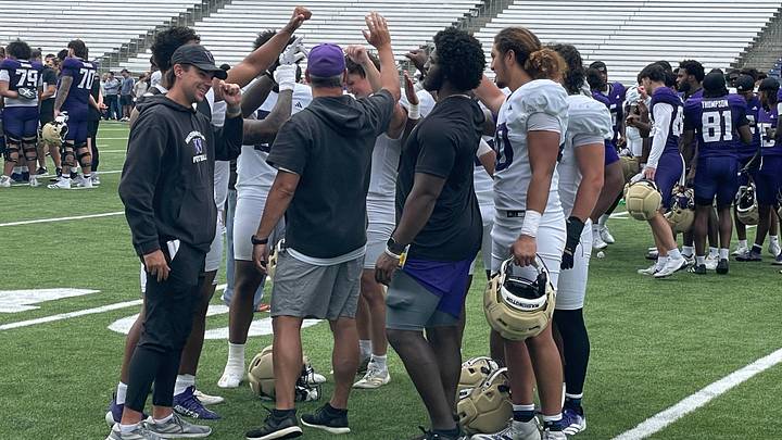 UW linebackers meet after the closing fall camp practice. UW linebackers meet after the closing fall camp practice.