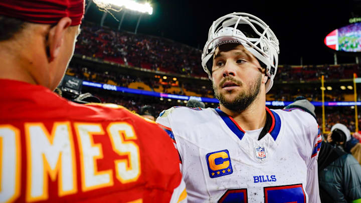Dec 10, 2023; Kansas City, Missouri, USA; Buffalo Bills quarterback Josh Allen (17) talks with Kansas City Chiefs quarterback Patrick Mahomes (15) after a game  at GEHA Field at Arrowhead Stadium. Mandatory Credit: Jay Biggerstaff-Imagn Images
