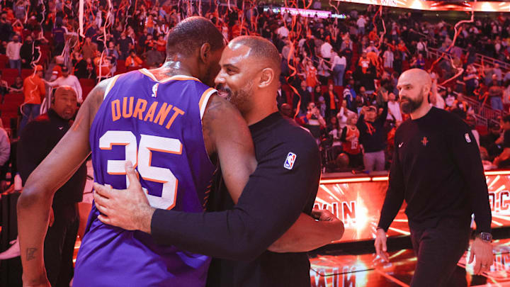 Feb 12, 2025; Houston, Texas, USA; Phoenix Suns forward Kevin Durant (35) hugs Houston Rockets head coach Ime Udoka after a game at Toyota Center. Mandatory Credit: Thomas Shea-Imagn Images