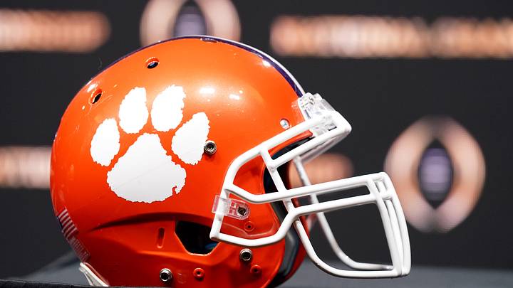 Jan 12, 2020; New Orleans, Louisiana, USA; A Clemson Tigers helmet on display before the head coaches press conference for the CFP with LSU Tigers head coach Ed Orgeron and Clemson Tigers head coach Dabo Swinney at the Sheraton New Orleans, Grand Ballroom. Jan 12, 2020; New Orleans, Louisiana, USA; A Clemson Tigers helmet on display before the head coaches press conference for the CFP with LSU Tigers head coach Ed Orgeron and Clemson Tigers head coach Dabo Swinney at the Sheraton New Orleans, Grand Ballroom.