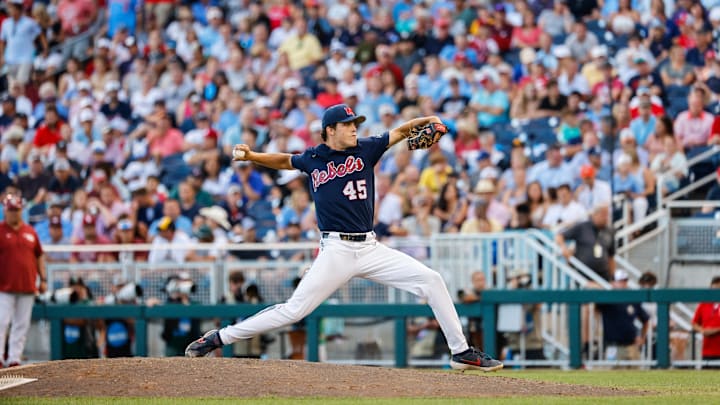Jun 25, 2022; Omaha, NE, USA;  Ole Miss pitcher Mason Nichols (45) pitches during the 7th inning at Charles Schwab Field. Mandatory Credit: Jaylynn Nash-Imagn Images