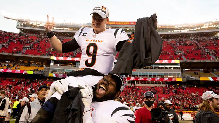 Jan 30, 2022; Kansas City, MO, USA; Cincinnati Bengals defensive tackle Tyler Shelvin (99) lifts Cincinnati Bengals quarterback Joe Burrow (9) after the AFC championship NFL football game, Sunday, Jan. 30, 2022, at GEHA Field at Arrowhead Stadium in Kansas City, Mo. Mandatory Credit: Albert Cesare-Imagn Images Jan 30, 2022; Kansas City, MO, USA; Cincinnati Bengals defensive tackle Tyler Shelvin (99) lifts Cincinnati Bengals quarterback Joe Burrow (9) after the AFC championship NFL football game, Sunday, Jan. 30, 2022, at GEHA Field at Arrowhead Stadium in Kansas City, Mo. Mandatory Credit: Albert Cesare-Imagn Images