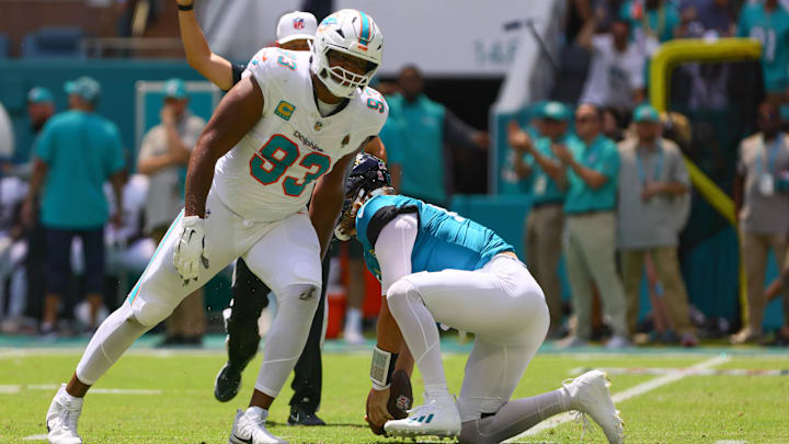 Miami Dolphins defensive tackle Calais Campbell (93) celebrates after sacking Jacksonville Jaguars quarterback Trevor Lawrence (16) during the first quarter at Hard Rock Stadium.