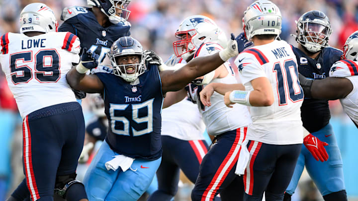 Nov 3, 2024; Nashville, Tennessee, USA;  Tennessee Titans defensive tackle Sebastian Joseph-Day (69) rushes New England Patriots quarterback Drake Maye (10) during the second half at Nissan Stadium. Mandatory Credit: Steve Roberts-Imagn Images