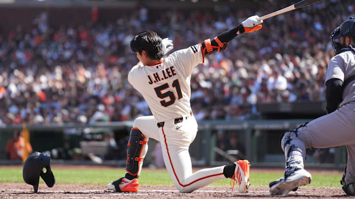 Mar 27, 2026; San Francisco, California, USA; San Francisco Giants right fielder Jung Hoo Lee (51) loses his helmet while striking out against the New York Yankees during the fifth inning at Oracle Park. Mandatory Credit: Darren Yamashita-Imagn Images