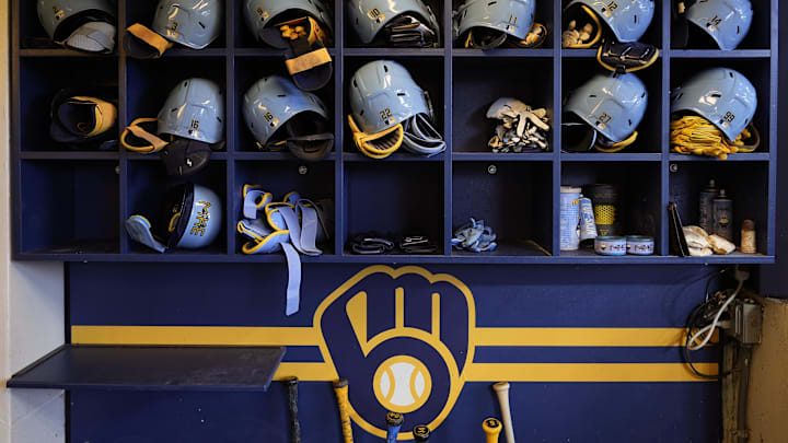 May 31, 2024; Milwaukee, Wisconsin, USA;  General view of Milwaukee Brewers batting helmets in the dugout prior to the game against the Chicago White Sox at American Family Field. Mandatory Credit: Jeff Hanisch-Imagn Images