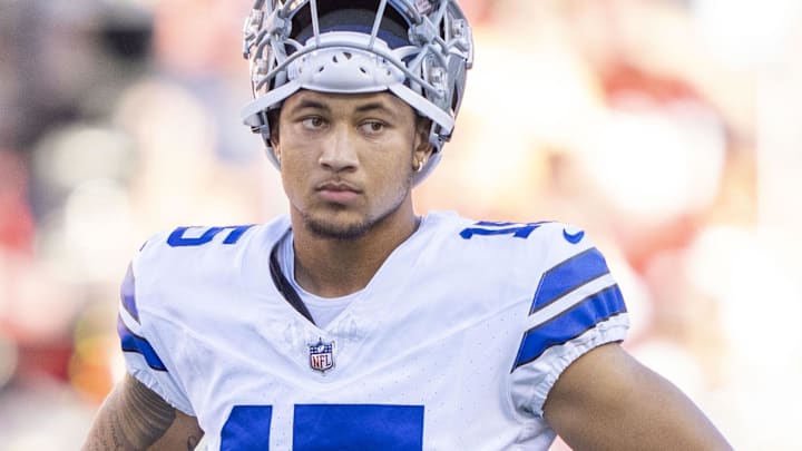 October 8, 2023; Santa Clara, California, USA; Dallas Cowboys quarterback Trey Lance (15) watches warm ups before the game against the San Francisco 49ers at Levi's Stadium. Mandatory Credit: Kyle Terada-Imagn Images
