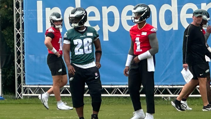Saquon Barkley and Jalen Hurts at Eagles practice on Aug. 5, 2025.