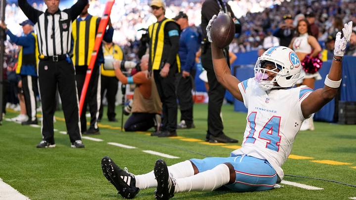 Tennessee Titans wide receiver Carnell Tate (14) pulls in touchdown pass Sunday, Oct. 18, 2026, during the game against the Indianapolis Colts at Lucas Oil Stadium in Indianapolis.