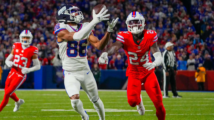 New York Giants wide receiver Darius Slayton (86) makes a catch against Buffalo Bills cornerback Kaiir Elam (24).