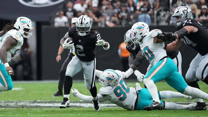 Las Vegas Raiders running back Ashton Jeanty (2) runs with the ball in the second quarter against the Miami Dolphins at Allegiant Stadium. 