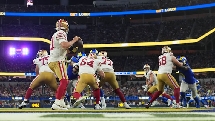 Oct 2, 2025; Inglewood, California, USA; San Francisco 49ers quarterback Mac Jones (10) drops back to pass against the Los Angeles Rams in the second half  at SoFi Stadium. Mandatory Credit: Kirby Lee-Imagn Images