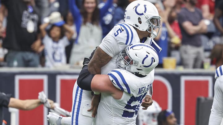 Oct 27, 2024; Houston, Texas, USA; Indianapolis Colts quarterback Anthony Richardson (5) celebrates with guard Quenton Nelson (56) after throwing a touchdown pass during the first quarter against the Houston Texans at NRG Stadium. Mandatory Credit: Troy Taormina-Imagn Images