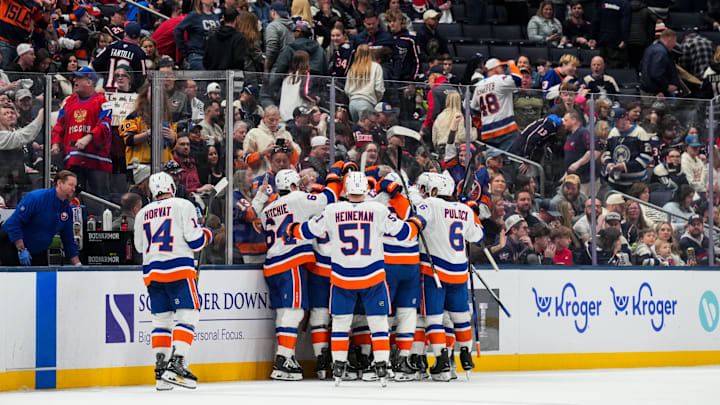 Feb 28, 2026; Columbus, Ohio, USA; New York Islanders right wing Simon Holmstrom (10) celebrates with teammates after scoring the game-winning goal against the Columbus Blue Jackets in the overtime period at Nationwide Arena. Mandatory Credit: Aaron Doster-Imagn Images Feb 28, 2026; Columbus, Ohio, USA; New York Islanders right wing Simon Holmstrom (10) celebrates with teammates after scoring the game-winning goal against the Columbus Blue Jackets in the overtime period at Nationwide Arena. Mandatory Credit: Aaron Doster-Imagn Images