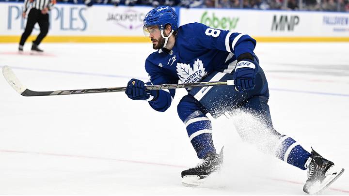 Sep 29, 2026; Toronto, Ontario, CAN;  Toronto Maple Leafs forward Kirill Marchenko (86) shoots the puck against the Montreal Canadiens in the third period at Scotiabank Arena.  Mandatory Credit: Dan Hamilton-Imagn Images