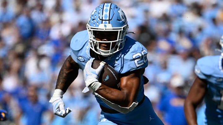 Oct 5, 2024; Chapel Hill, North Carolina, USA; North Carolina Tar Heels running back Omarion Hampton (28) runs in the second quarter at Kenan Memorial Stadium. Mandatory Credit: Bob Donnan-Imagn Images