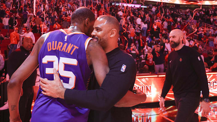 Feb 12, 2025; Houston, Texas, USA; Phoenix Suns forward Kevin Durant (35) hugs Houston Rockets head coach Ime Udoka after a game at Toyota Center. Mandatory Credit: Thomas Shea-Imagn Images