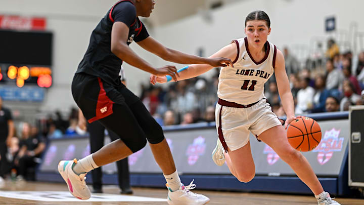 Apr 8, 2023; Washington, DC, USA; Lone Peak (UT) guard Kailey Woolston (11) drives to the basket during the third quarter against Sidwell Friends (DC) at Georgetown University. Mandatory Credit: Reggie Hildred-Imagn Images