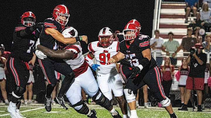 Brandon quarterback Sladen Shack (10) passes the ball while being tacked by Petal defensive lineman Corey Wells (74) during a high school football game between Petal and Brandon at Bulldog Stadium in Brandon, Miss., on Friday, Oct. 17, 2025. Petal defeated Brandon 27-21. Brandon quarterback Sladen Shack (10) passes the ball while being tacked by Petal defensive lineman Corey Wells (74) during a high school football game between Petal and Brandon at Bulldog Stadium in Brandon, Miss., on Friday, Oct. 17, 2025. Petal defeated Brandon 27-21.