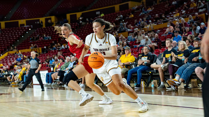 Arizona State Sun Devils McKinna Brackens (21) runs with the ball during a game against the Eastern Washington Eagles at Desert Financial Arena in Tempe, on Nov. 8, 2025. Arizona State Sun Devils McKinna Brackens (21) runs with the ball during a game against the Eastern Washington Eagles at Desert Financial Arena in Tempe, on Nov. 8, 2025.