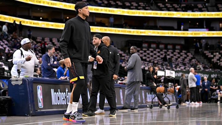 Mar 9, 2025; Dallas, Texas, USA; Phoenix Suns guard Devin Booker (1) warms up before the game between the Dallas Mavericks and the Phoenix Suns at the American Airlines Center. 