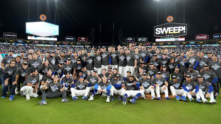 The Los Angeles Dodgers celebrate on the field after defeating the Milwaukee Brewers in Game 4 of the NLCS at Dodger Stadium. The Los Angeles Dodgers celebrate on the field after defeating the Milwaukee Brewers in Game 4 of the NLCS at Dodger Stadium.