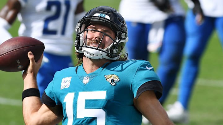 Jacksonville Jaguars quarterback Gardner Minshew (15) prepares to spike the ball after he scrambled into the end zone for a late third quarter touchdown.