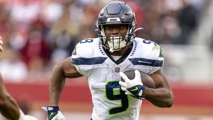 November 17, 2024; Santa Clara, California, USA; Seattle Seahawks running back Kenneth Walker III (9) runs the football against the San Francisco 49ers during the third quarter at Levi's Stadium. Mandatory Credit: Kyle Terada-Imagn Images