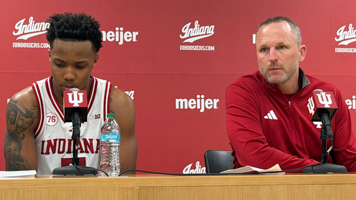 Indiana basketball guard Nick Dorn (left) and coach Darian DeVries (right) speak to media Nov. 29, 2025, at Assembly Hall.