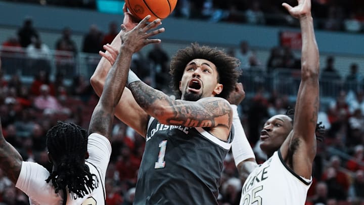 Louisville's J'Vonne Hadley (1) shoots against the Wake Forest defense during their game at the KFC Yum! Center in Louisville, Ky. on Jan. 28, 2025