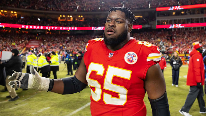 Jan 26, 2025; Kansas City, MO, USA; Kansas City Chiefs guard Trey Smith (65) against the Buffalo Bills in the AFC Championship game at GEHA Field at Arrowhead Stadium. Mandatory Credit: Mark J. Rebilas-Imagn Images