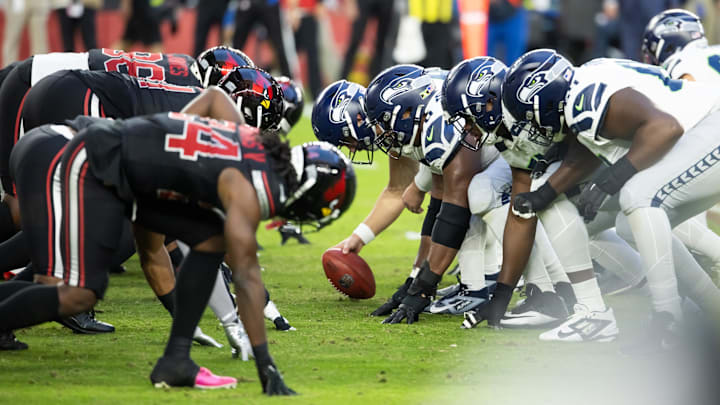 Dec 8, 2024; Glendale, Arizona, USA; General view down the line of scrimmage as the Seattle Seahawks prepare to snap the ball against the Arizona Cardinals at State Farm Stadium.